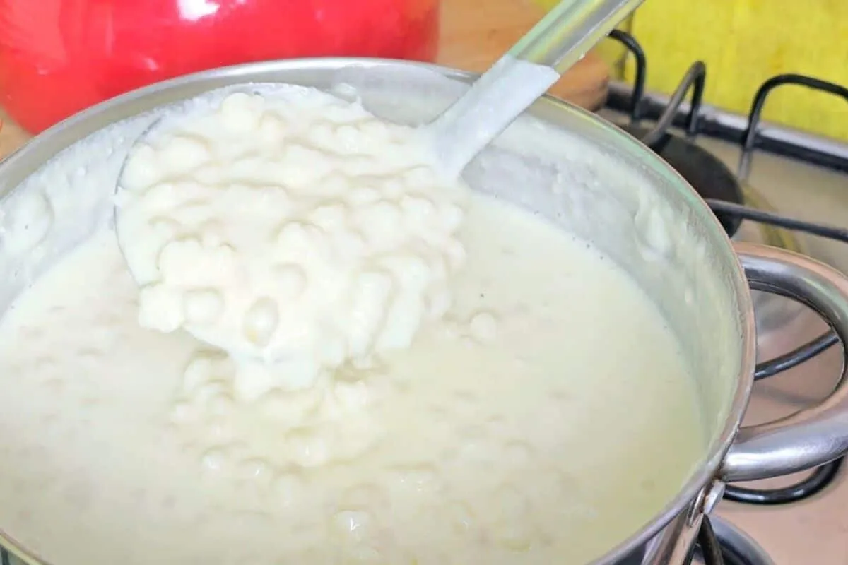 Canjica branca cremosa feita na panela de pressao bem macia